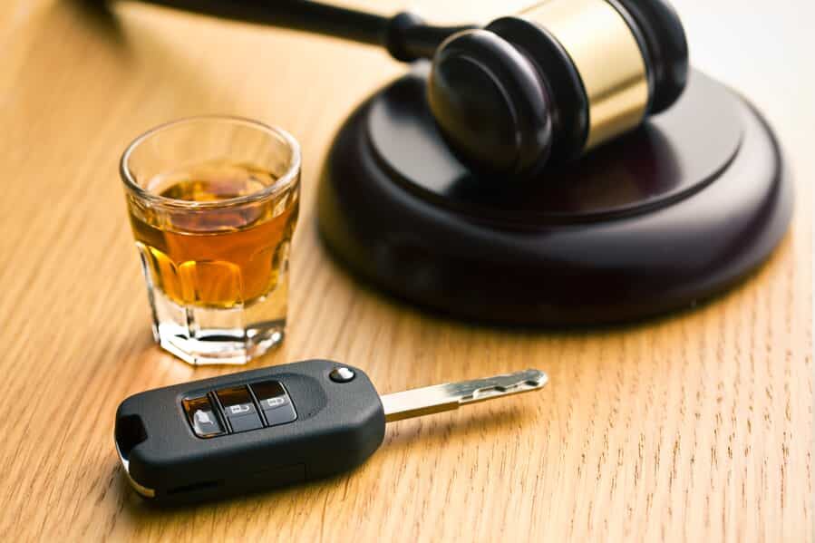 Keys Next to Alcohol & a Gavel